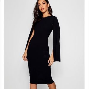 Long sleeved midi dress.